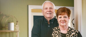 Newlyweds Johnny and Mary Smith stand in their home. [DAN BUSEY/TIMESDAILY]