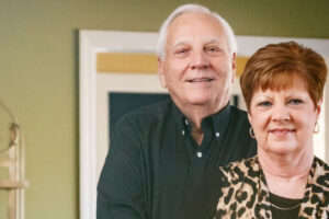 Newlyweds Johnny and Mary Smith stand in their home. [DAN BUSEY/TIMESDAILY]