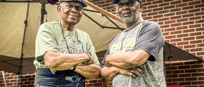Riley Young, left, and Andrew Watkins pose for a portrait during a fundraising fish fry at the Michael Center on Saturday, May 3, 2025, in Sheffield, Ala.