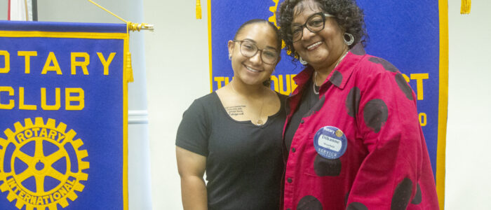 Mentee XXXXXXX, left, and Dihanne Westfield stand for a portrait together before a Florence Rotary Club meeting on Monday, May 5, 2025, in Florence, Ala.