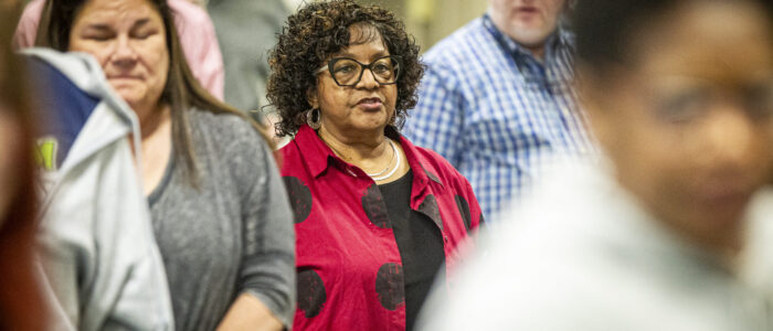 Dihanne Westfield, center, joins others in reciting the Four Way Test at the conclusion of a Florence Rotary Club meeting on Monday, May 5, 2025, in Florence, Ala.