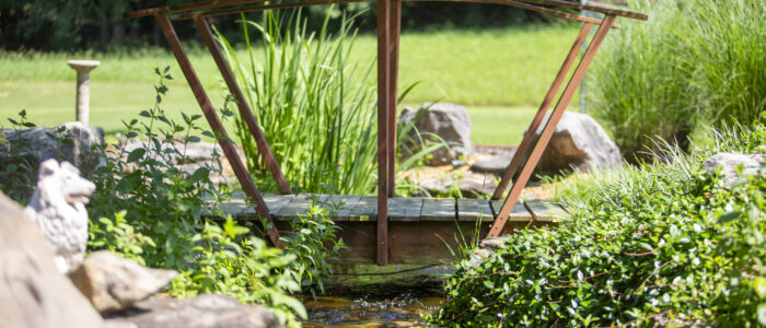 Water flows under a bridge that Andy Brown designed.