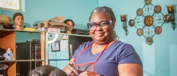 LaSondra Stanford works on a client’s hair